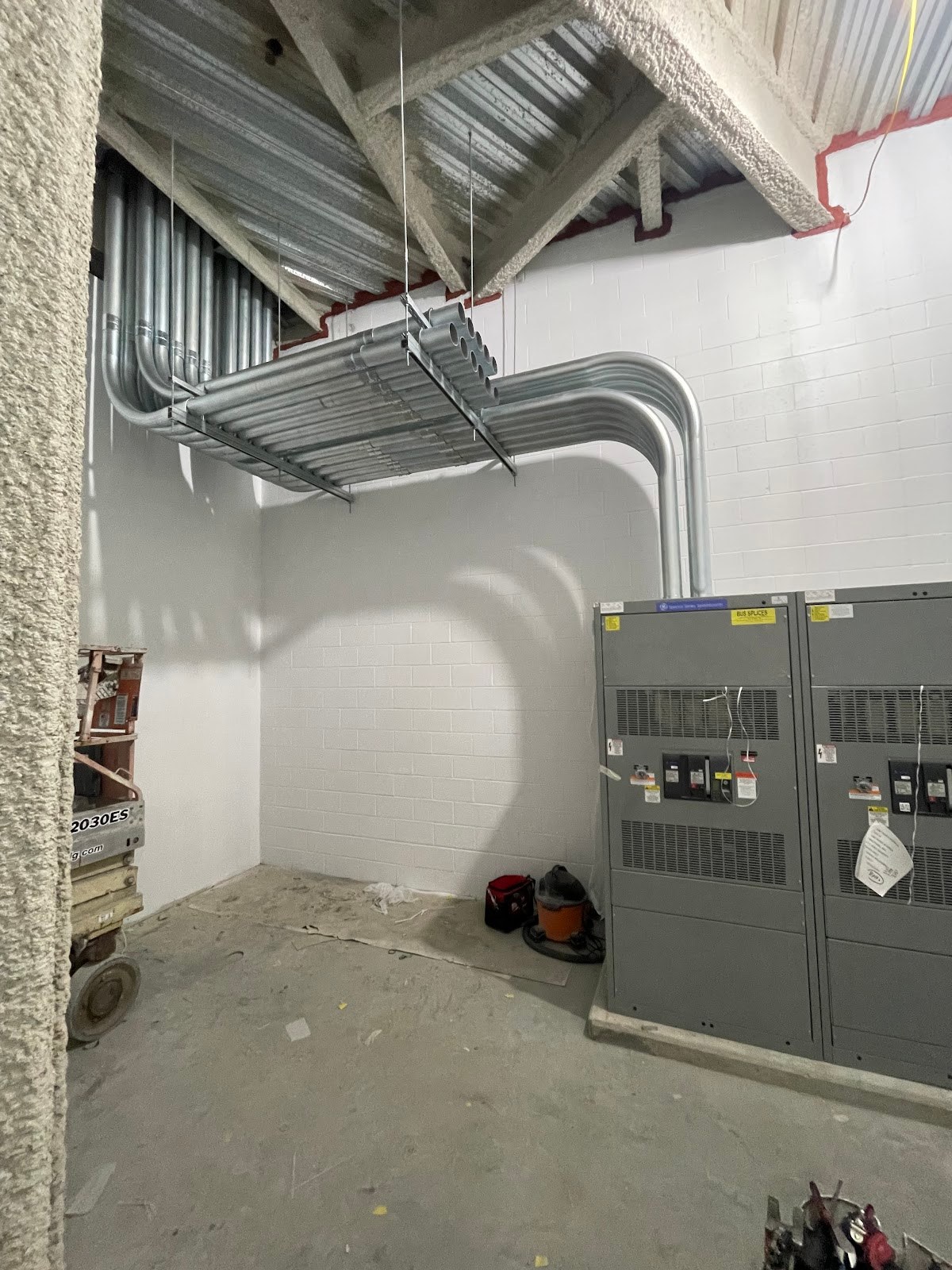 Commercial switchgear and overhead conduit installed by Almon Electric